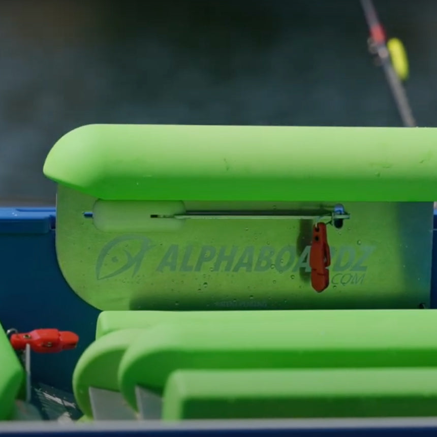 Closeup of a green Alphaboardz planer board.