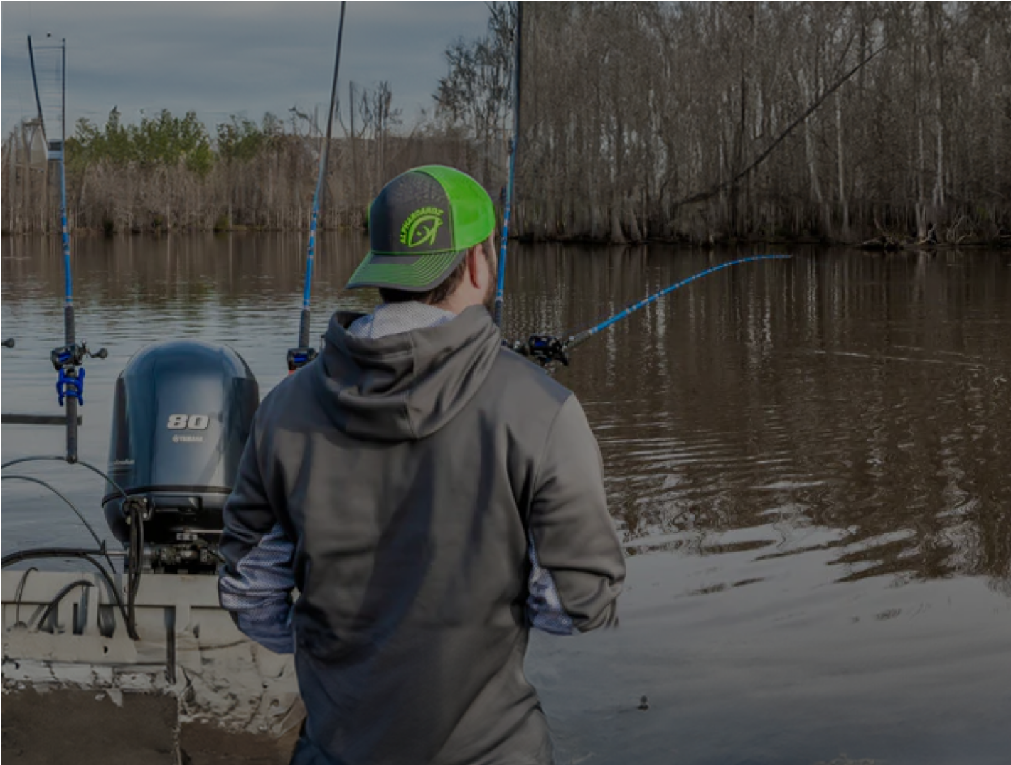 Angler wearing Alphaboardz fishing apparel.